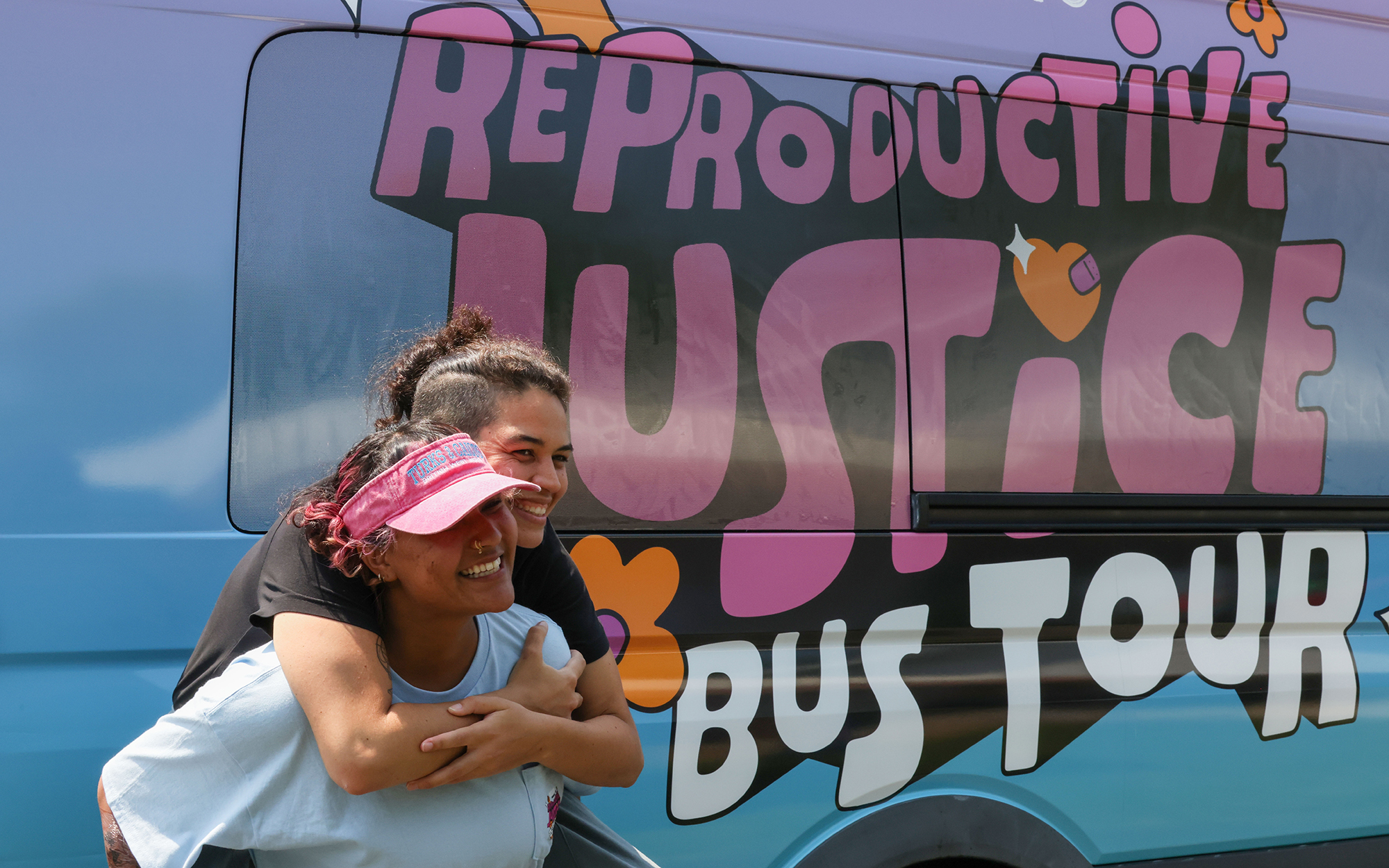 Simran Jain and Maya Hart are co-workers at SisterSong and helped out with the group’s Reproductive Justice Bus Tour, which stopped in Wingate, N.C., on June 17, 2023. (Photo by Shelby Rae Wills/News21)