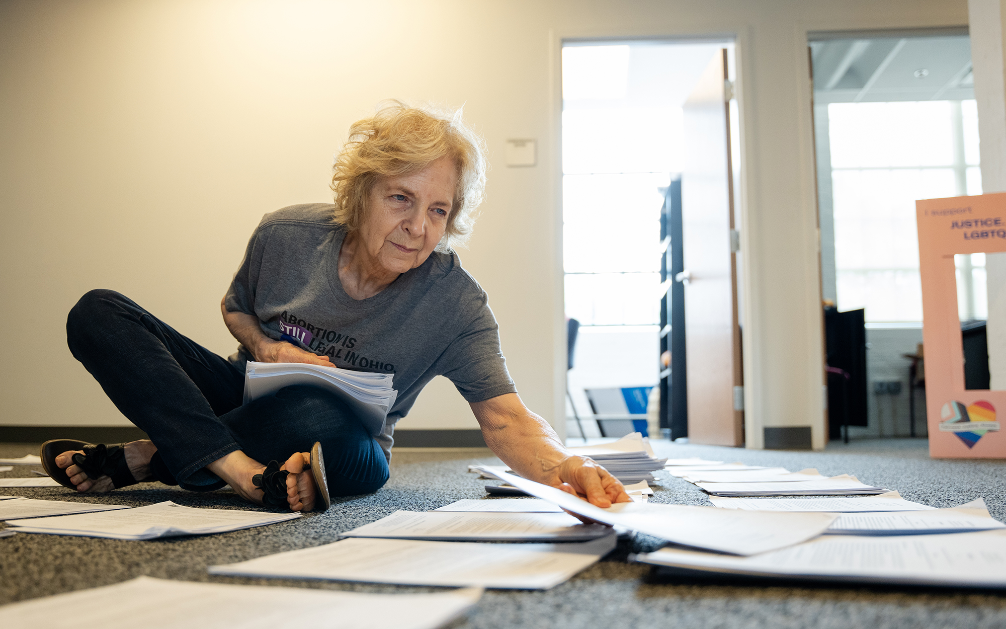 Bobbie Ackerman organizes petitions at the American Civil Liberties Union of Ohio office in Columbus on June 26, 2023. The group helped lead the push to get a constitutional amendment to protect abortion rights on the November ballot. (Photo by Mingson Lau/News21)