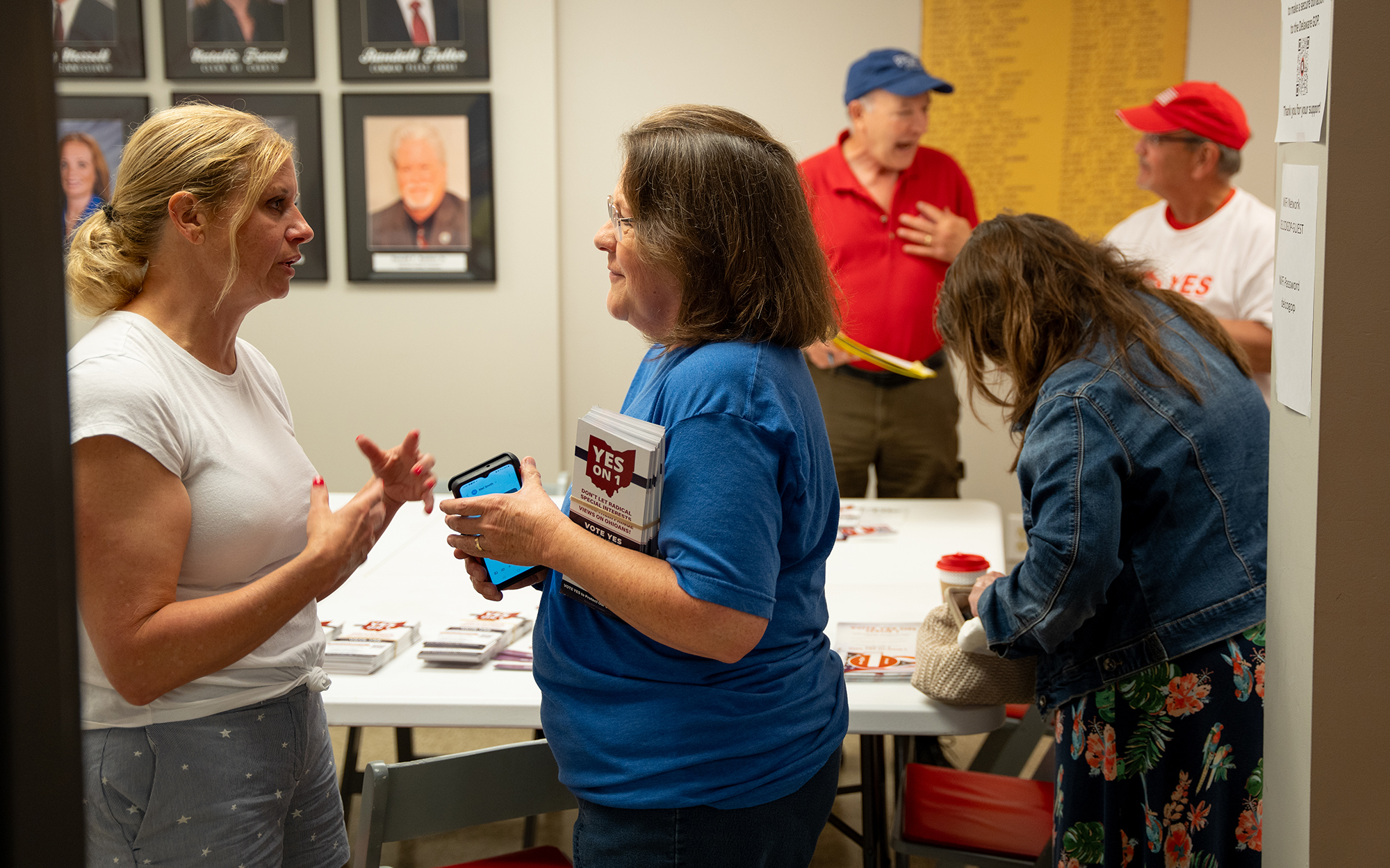 Delaware residents Sue Lorenz, left, and Diane Strait talk during an event at the Delaware County Republican Party headquarters on June 24, 2023. (Photo by Mingson Lau/News21)