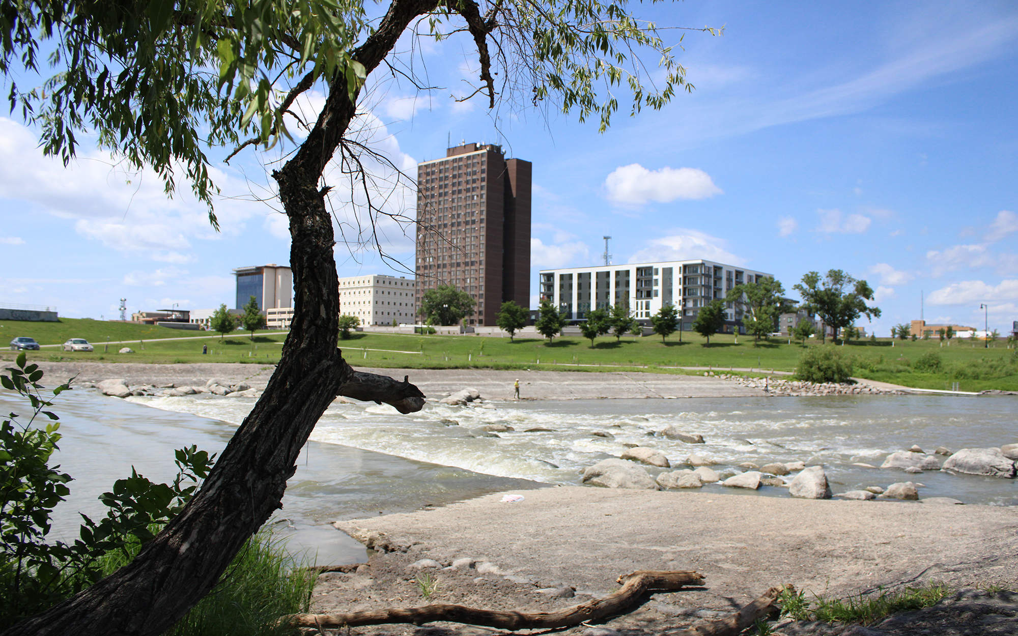 Downtown Fargo, North Dakota, is seen from the Moorhead, Minnesota, side of the Red River on July 8, 2023. Red River Women’s Clinic moved to Moorhead from Fargo after the Supreme Court ended federal protections of abortion. (Photo by Morgan Fischer/News21)